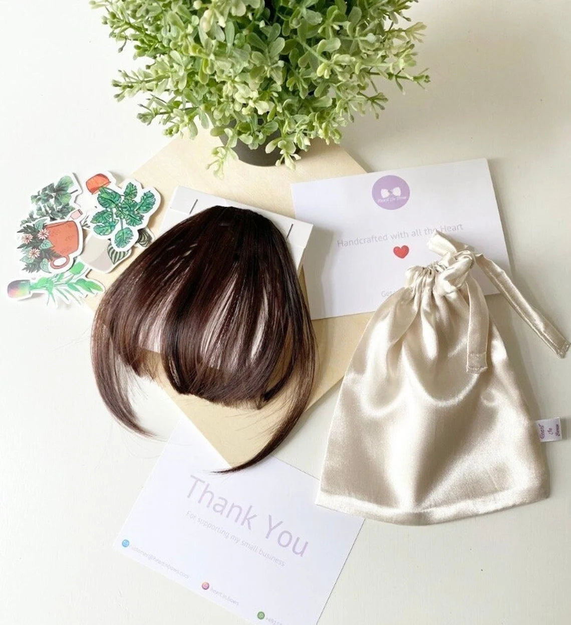 Frange de cheveux, une seule pince