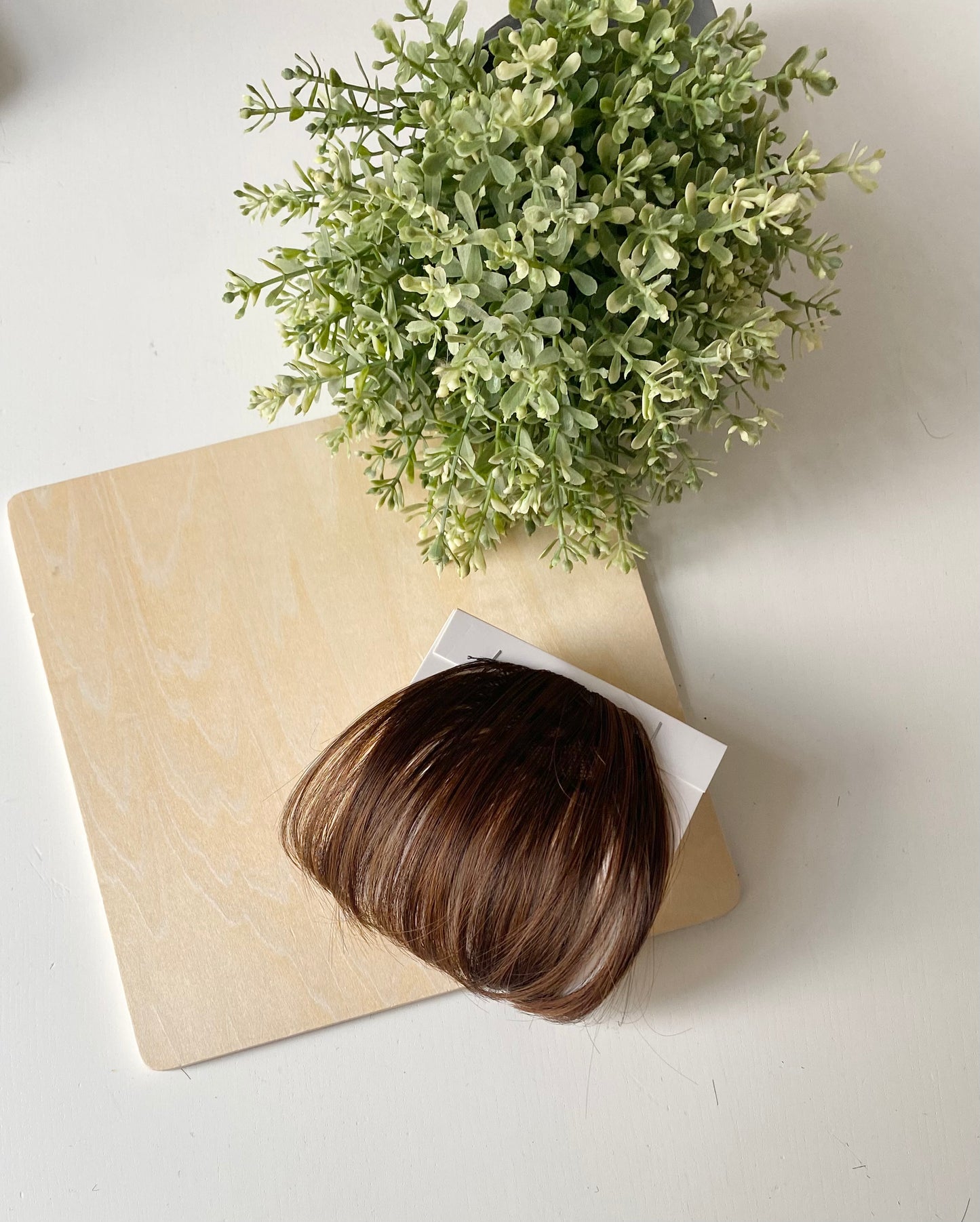 Frange de cheveux, une seule pince