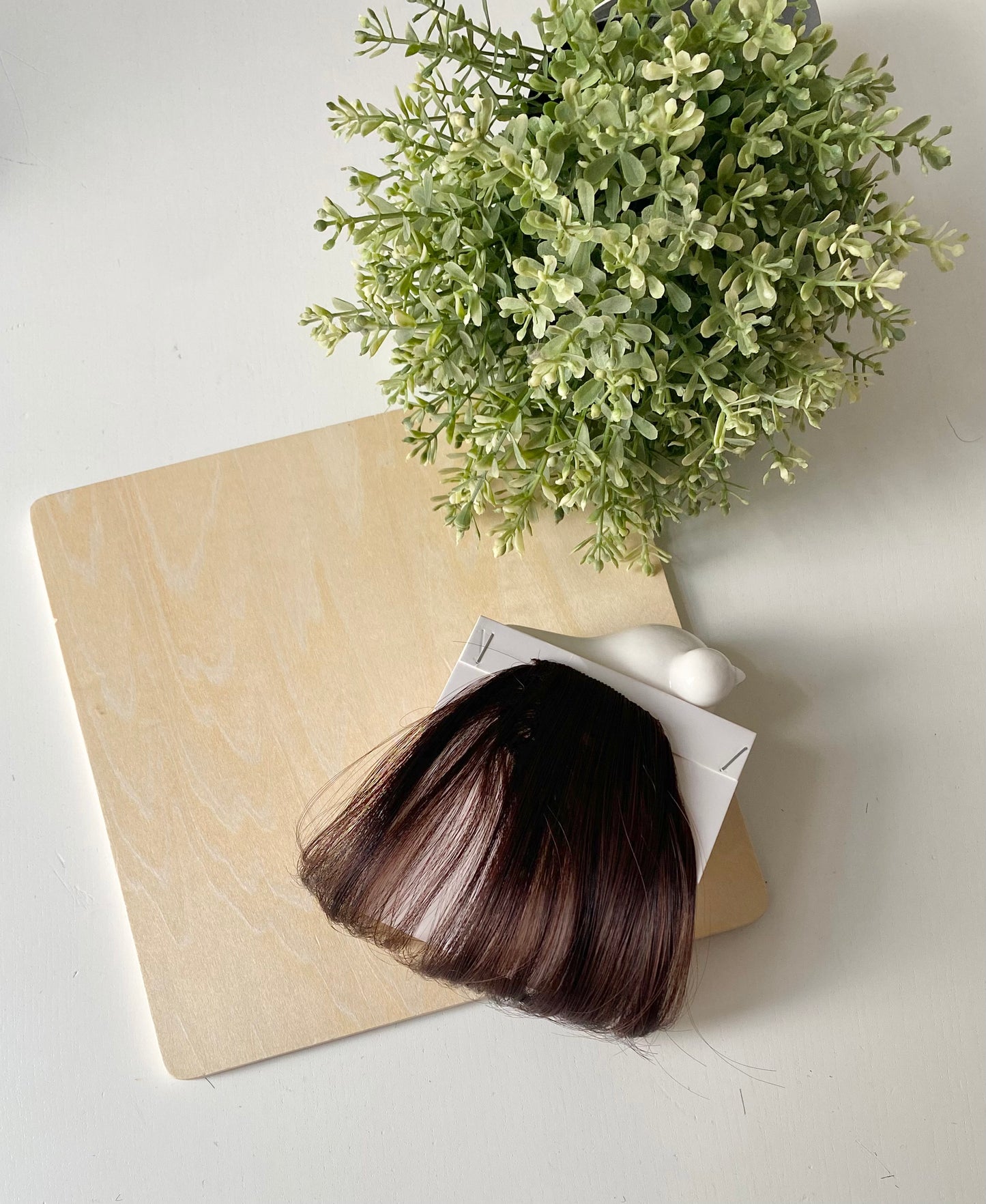 Frange de cheveux, une seule pince