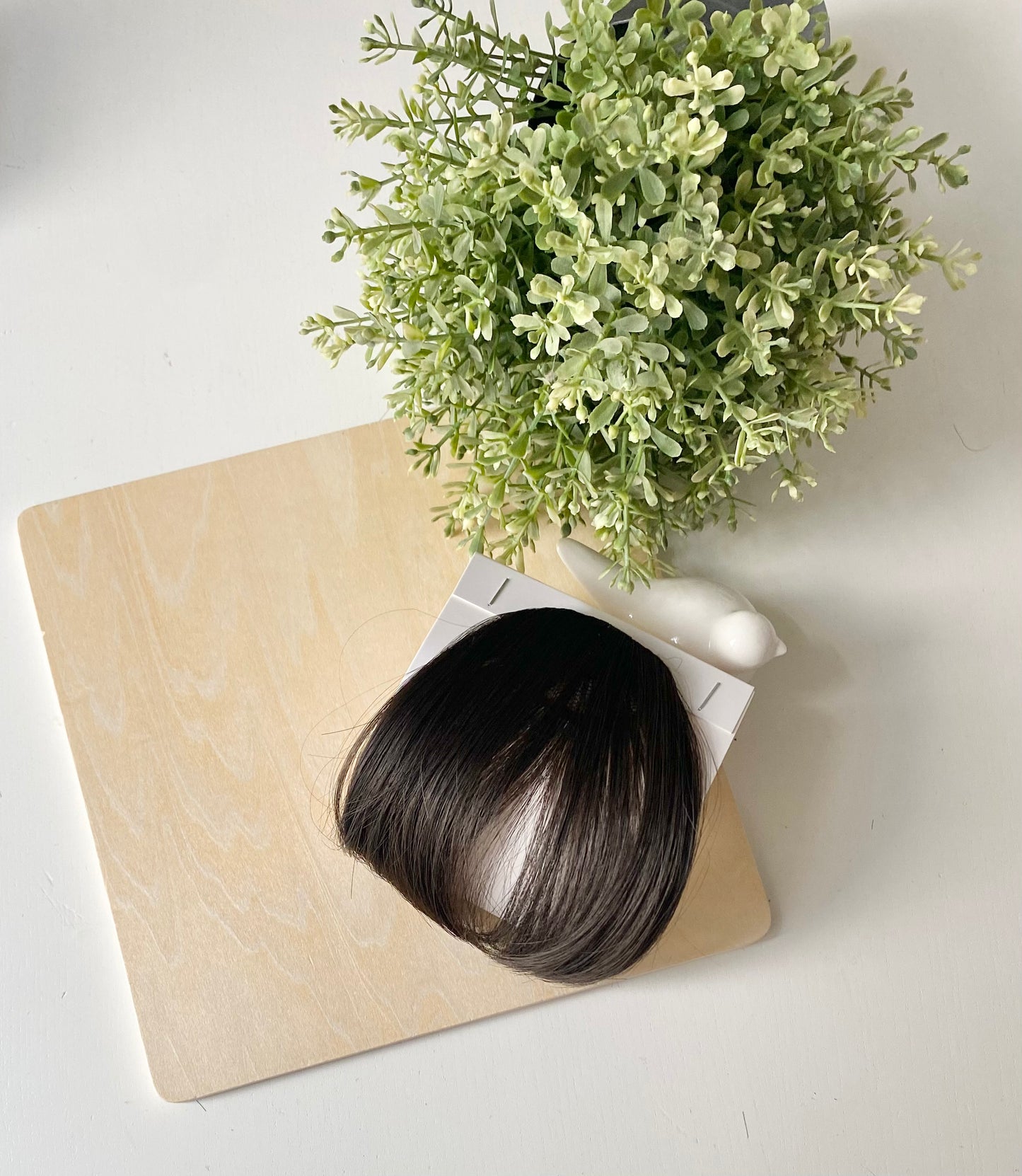 Frange de cheveux, une seule pince