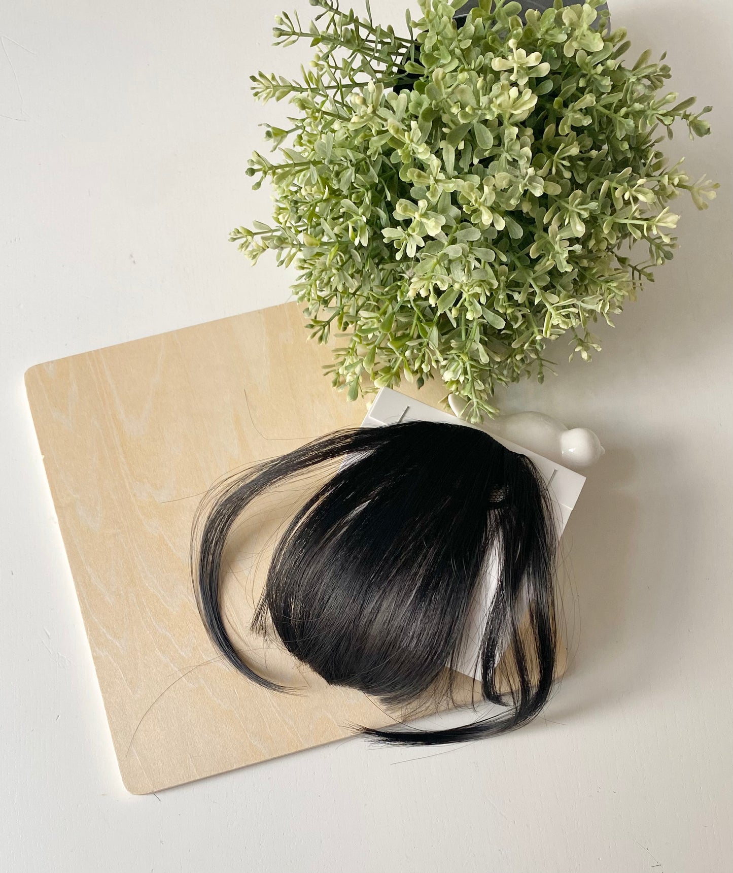 Frange de cheveux, une seule pince