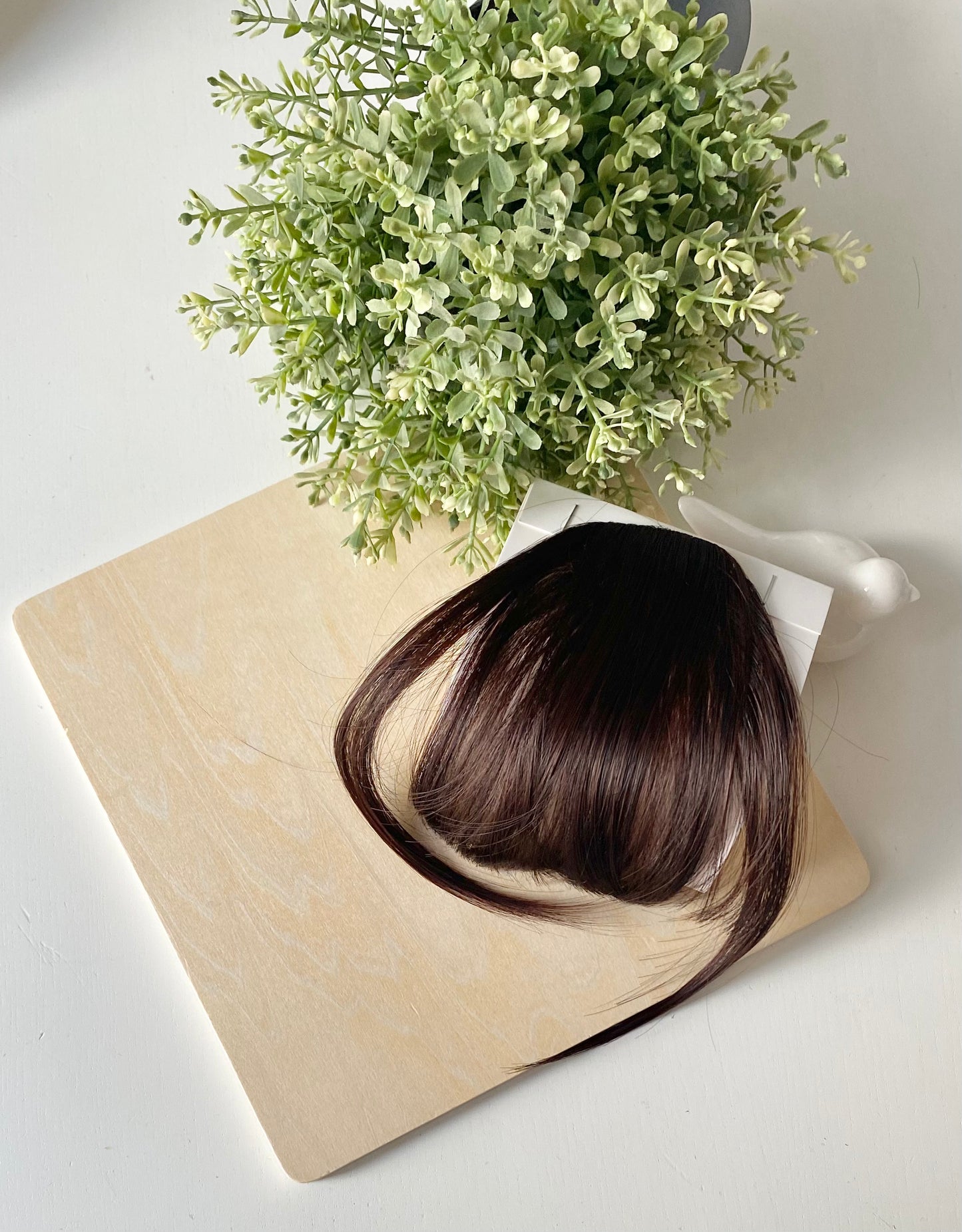 Frange de cheveux, une seule pince